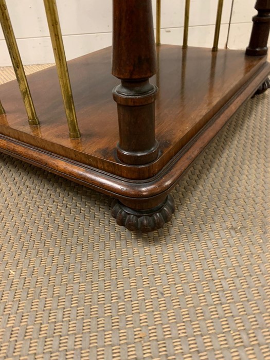 A mahogany two tiered table with brass supports to sides (H82cm W61cm D45cm) - Image 5 of 6