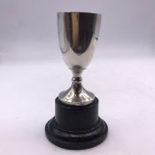 A small hallmarked silver cup on stand SB&S Ltd, Birmingham.