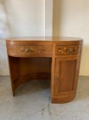 A kidney shape dressing table, inlaid with floral design