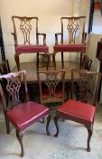 A Victorian mahogany extending dining table with wind out action, carved edged top over a baluster