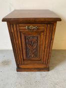 A carved front pot cupboard (H56cm D37cm W37cm)