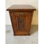 A carved front pot cupboard (H56cm D37cm W37cm)