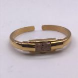 An 18ct gold Butex Bangle watch (20.8g) taking back