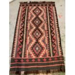 A black and red woven rug/carpet (176cm x 100cm)