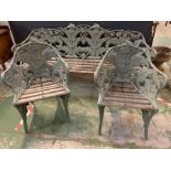 A Coalbrookdale cast iron garden set comprising of a bench and two chairs of leaf design, the