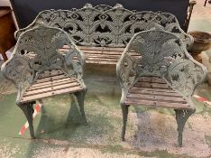 A Coalbrookdale cast iron garden set comprising of a bench and two chairs of leaf design, the