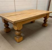 A large solid oak low table (H55cm D56cm W86cm)