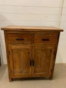 A hardwood two door cabinet (H90cm W80cm D40cm)