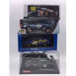 Four boxed vechiles to include Revell Shelby Cobra Daytona Coupe, Bentley EXP Speed 8, Porsche GTI