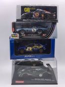 Four boxed vechiles to include Revell Shelby Cobra Daytona Coupe, Bentley EXP Speed 8, Porsche GTI