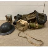 A WW2 Gas mask and helmet