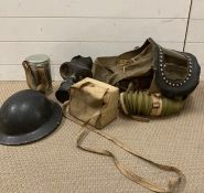 A WW2 Gas mask and helmet