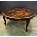 A scallop edged coffee table