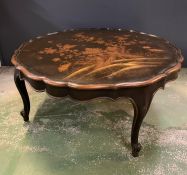 A scallop edged coffee table