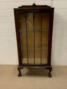 A China Cabinet with two glass shelves on ball and claw feet. H 127cm x W 60 cm x D 34cm. AF
