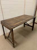 A vintage wooden folding table