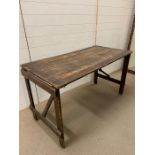 A vintage wooden folding table