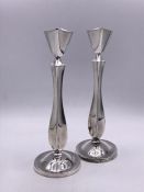 A Pair of Danish, white metal, candlesticks.