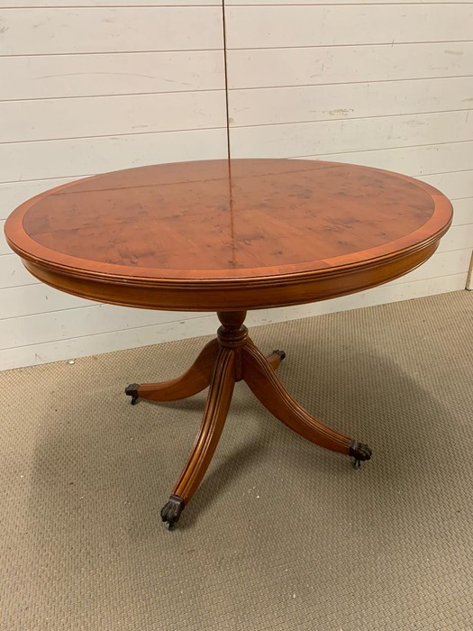 Circular centre table on three down swept legs (H78cm Dia 109cm)