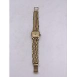 A Ladies Marvin 9ct Gold watch (Total weight 38g)