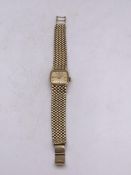 A Ladies Marvin 9ct Gold watch (Total weight 38g)