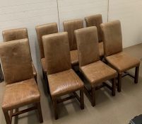 Eight leather dining chairs