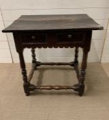 A Late 17th Century oak side table, rectangular top on block and ring turned legs, joined by