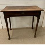 A Jointed Oak side table on pad feet H 70 cm W 77cm x D 40cm