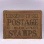 An unused enamel Postage sign, with original wrapping.