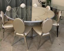 A eight seater contemporary circular mirrored dining tables and chairs AF