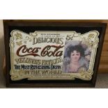 A vintage "Coca-Cola Relieves Fatigue(...)" advert-hanging mirror with wooden frame (50x65 cm)