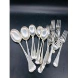 A Selection of hallmarked silver spoons and forks (1045g)