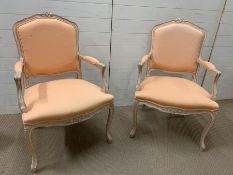 A pair of Louis XV style fauteuils (chairs) with cartouche shaped backs, arms and seats on