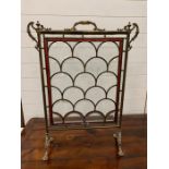 A period stainless fire screen in a brass frame AF