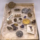 A Selection of various medals, medallions and badges, including a replica George Cross