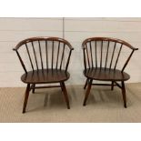 Two Ercol Cowhorn chairs