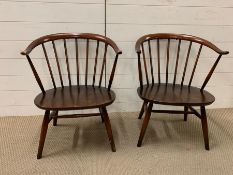 Two Ercol Cowhorn chairs