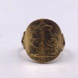 A 1911 Gold Sovereign ring on a 9ct gold mount (Total Weight 9.7g)