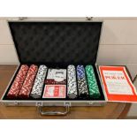 A poker set in metal carry case