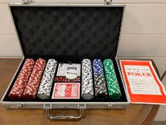 A poker set in metal carry case