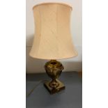 Brass table or desk lamp with lions and floral design to centre