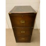 A mahogany office filing cabinet with brass handles in the campaign style (H104cm W50cm D65cm)