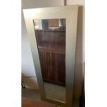 Long wall mirror in a silver gilt frame (62cm x 162cm)