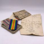 A Selection of WWI and WWII medal ribbons in orginal box.