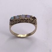 A 9 ct opal ring, with missing stone. (Total weight 2.3g) Size O
