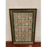 A framed collection of cricketers, 1934 John Player and Sons cigarette cards