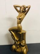 A Carved Figure of a Nude