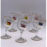 A set of six novelty tipsy glasses