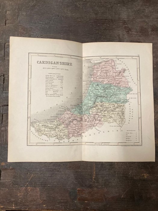 After John Speed (1552-1629) English, a partially coloured map of Denbighshire, embellished with - Image 5 of 6