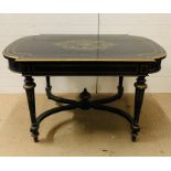 A black lacquer centre table